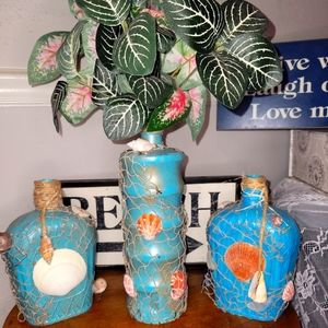 Custom-made bottles with shells & handmade sea glass